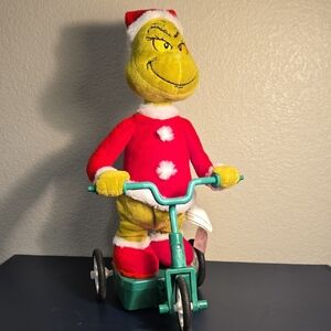 Gemmy Grinch Plush on Tricycle - Red and Green